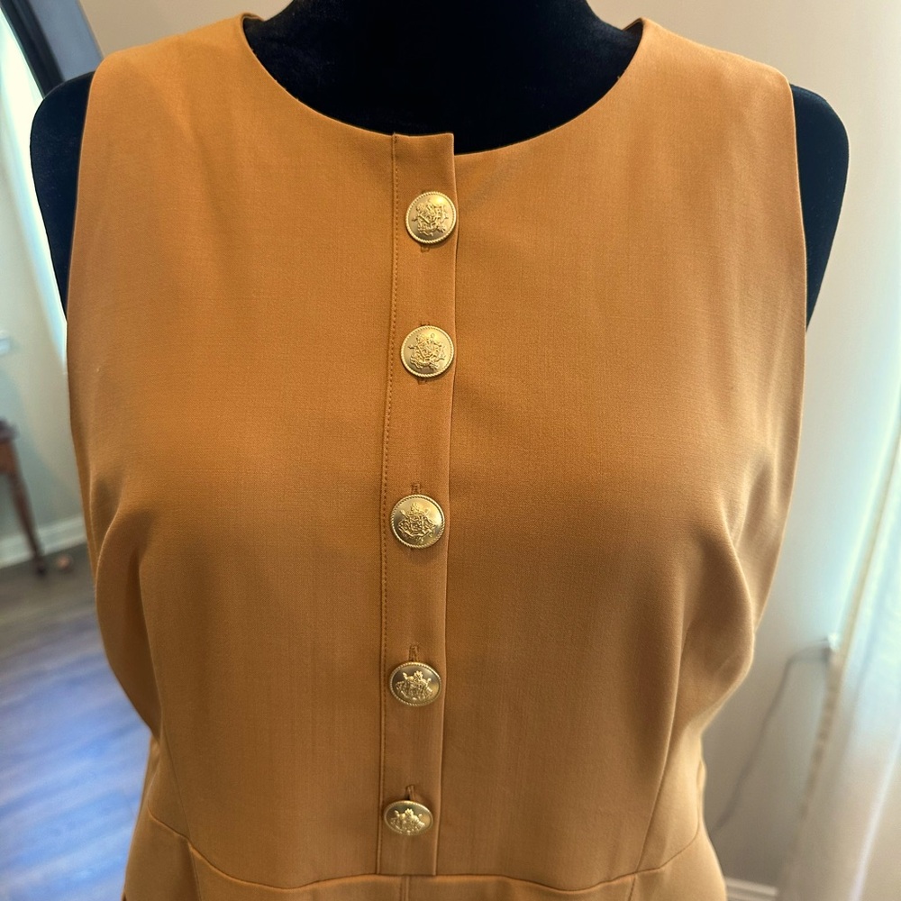 Pleated mini dress.  Pockets, golden buttons, and Italian bi-stretch wool blend.